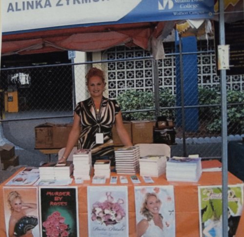 Alinka at signing table